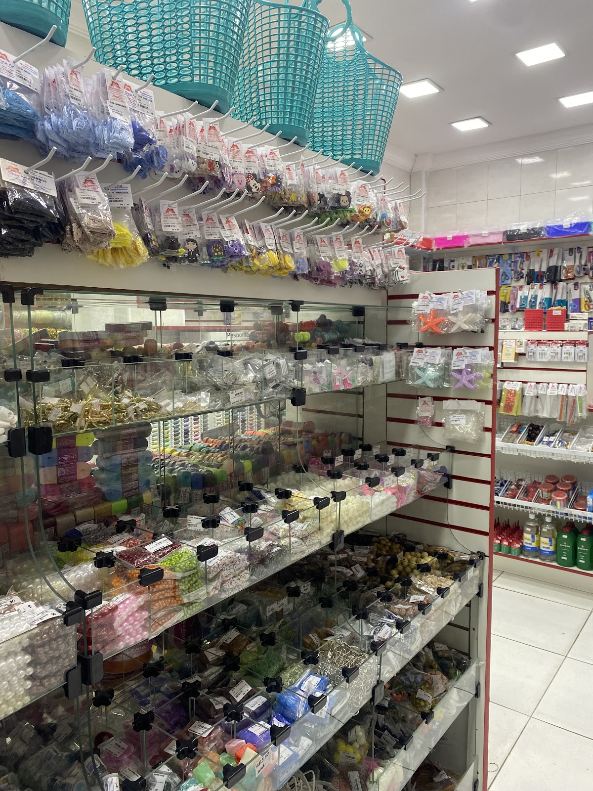 Singer - Dina Armarinhos São Vicente